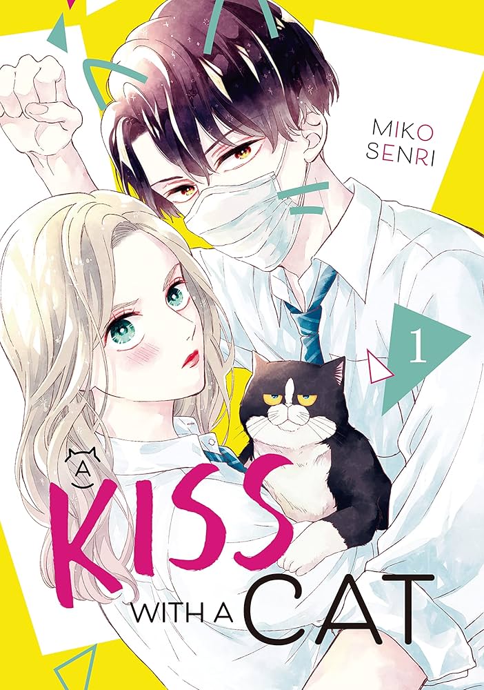 a kiss with a cat volume 1 cover. a blonde girl and a cool guy wearing a mask hold a chubby black and white tuxedo cat together.