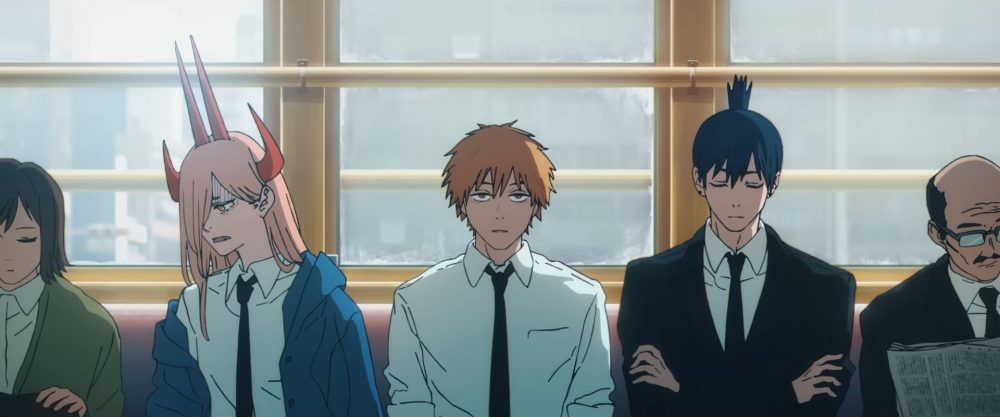 Denji spacing out on a streetcar ride with Aki and Power in the opening minutes of the CHAINSAW MAN MOVIE.