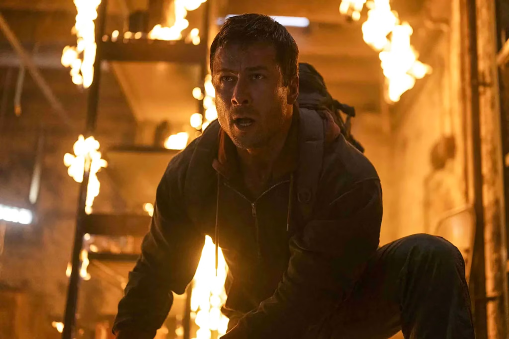 Things really heat up for Glen Powell in The Running Man